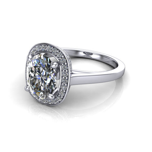 Hayden oval halo engagement ring in 14K White Gold, three-quarter perspective showing the haloed center above a plain polished band with a peekaboo gallery accent