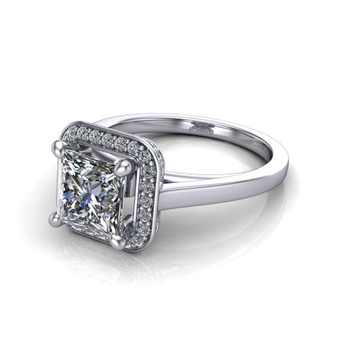 Hayden princess halo engagement ring in 18K White Gold, three-quarter perspective showing the haloed center above a plain polished band with a peekaboo gallery accent