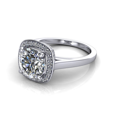 Hayden round halo engagement ring in 18K White Gold, three-quarter perspective showing the haloed center above a plain polished band with a peekaboo gallery accent