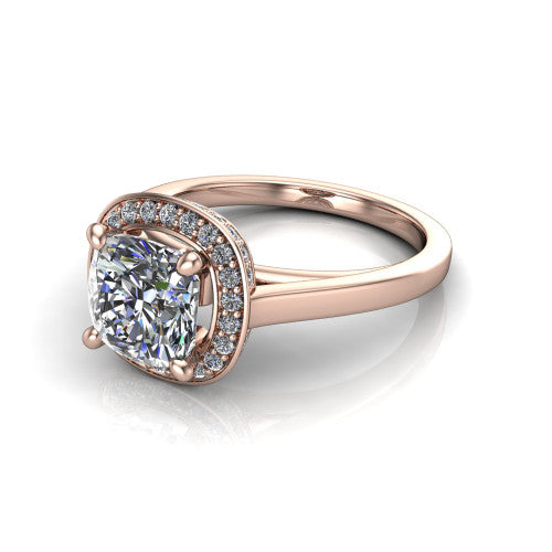 Hayden cushion halo engagement ring in 14K Rose Gold, three-quarter perspective showing the haloed center above a plain polished band with a peekaboo gallery accent