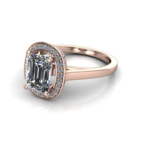 Hayden emerald halo engagement ring in 18K Rose Gold, three-quarter perspective showing the haloed center above a plain polished band with a peekaboo gallery accent