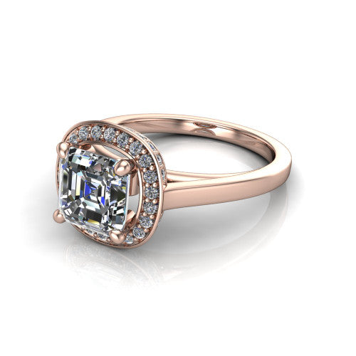 Hayden square emerald halo engagement ring in 14K Rose Gold, three-quarter perspective showing the haloed center above a plain polished band with a peekaboo gallery accent