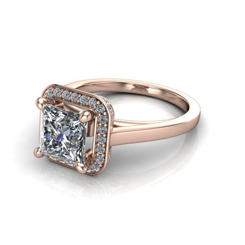Hayden princess halo engagement ring in 18K Rose Gold, three-quarter perspective showing the haloed center above a plain polished band with a peekaboo gallery accent
