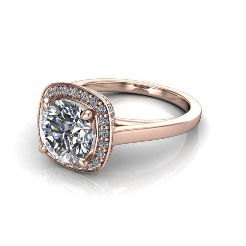 Hayden round halo engagement ring in 14K Rose Gold, three-quarter perspective showing the haloed center above a plain polished band with a peekaboo gallery accent
