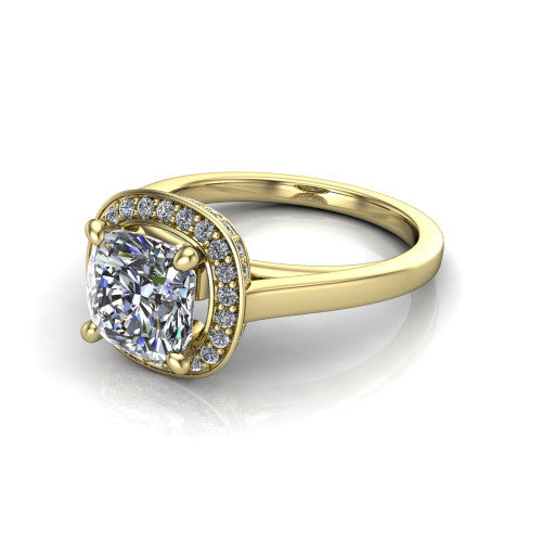 Hayden cushion halo engagement ring in 14K Yellow Gold, three-quarter perspective showing the haloed center above a plain polished band with a peekaboo gallery accent