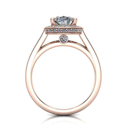Hayden oval halo engagement ring in 14K Rose Gold, through-finger front profile showing the cathedral gallery with a bezel-set peekaboo diamond beneath the center