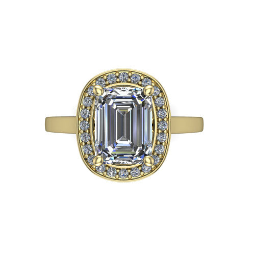 Hayden emerald halo engagement ring in 18K Yellow Gold, top-down view showing the center framed by a emerald pav&eacute; halo with compass prongs