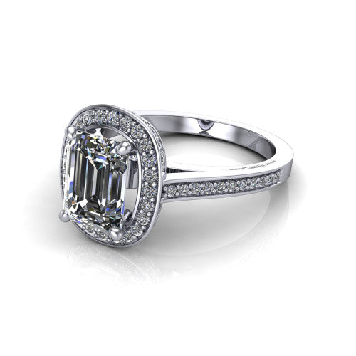 Giselle emerald halo engagement ring in 18K White Gold, three-quarter perspective showing the milgrain haloed center above a pav&eacute; band with a peekaboo gallery accent