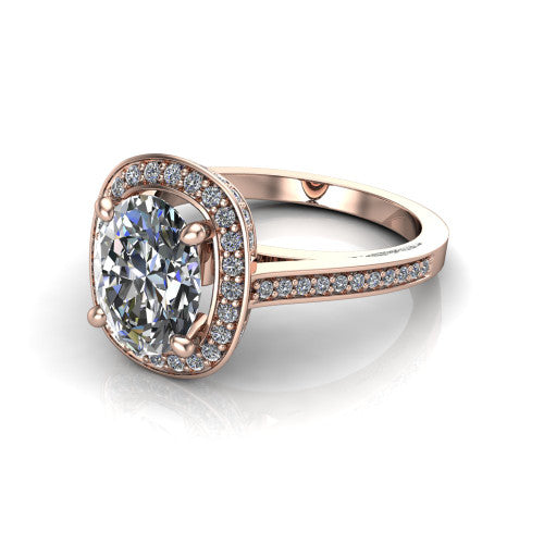 Giselle oval halo engagement ring in 18K Rose Gold, three-quarter perspective showing the milgrain haloed center above a pav&eacute; band with a peekaboo gallery accent