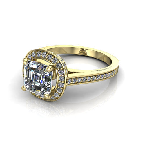 Giselle square emerald halo engagement ring in 14K Yellow Gold, three-quarter perspective showing the milgrain haloed center above a pav&eacute; band with a peekaboo gallery accent
