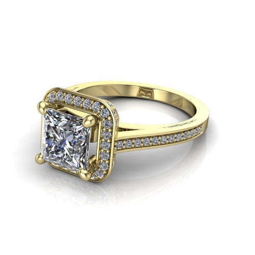 Giselle princess halo engagement ring in 14K Yellow Gold, three-quarter perspective showing the milgrain haloed center above a pav&eacute; band with a peekaboo gallery accent