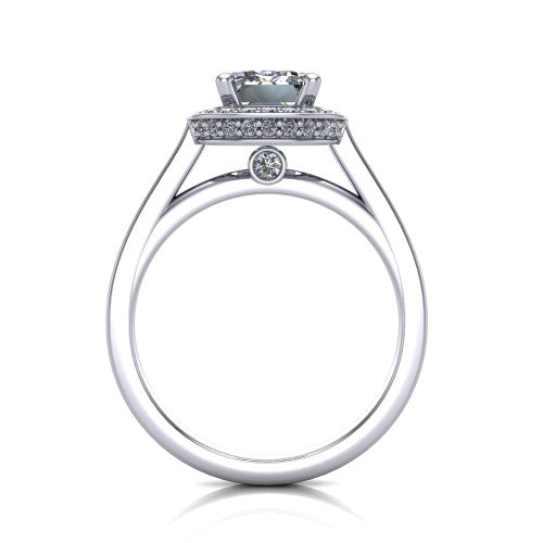Giselle emerald halo engagement ring in 18K White Gold, through-finger front profile showing the cathedral gallery with a bezel-set peekaboo diamond beneath the center