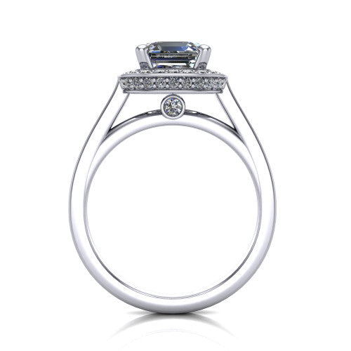 Giselle square emerald halo engagement ring in 18K White Gold, through-finger front profile showing the cathedral gallery with a bezel-set peekaboo diamond beneath the center