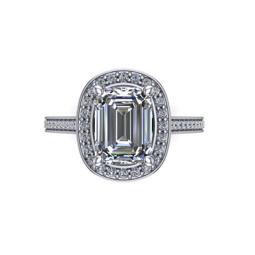 Giselle emerald halo engagement ring in 14K White Gold, top-down view showing the center framed by a emerald milgrain pav&eacute; halo with compass prongs