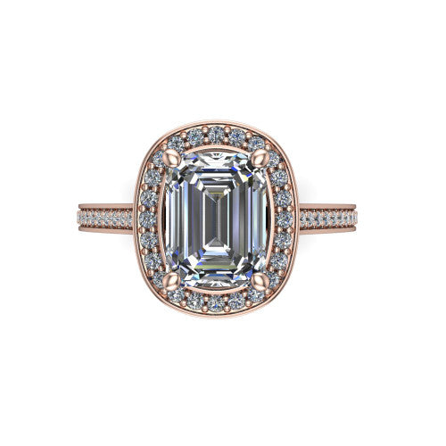 Giselle emerald halo engagement ring in 18K Rose Gold, top-down view showing the center framed by a emerald milgrain pav&eacute; halo with compass prongs