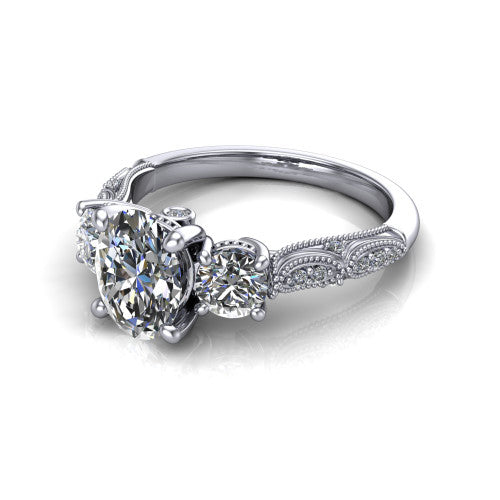 Rosemary oval three stone engagement ring in 14K White Gold, three-quarter perspective showing the three-stone row with milgrain shoulders and filigree detailing above a pav&eacute; band