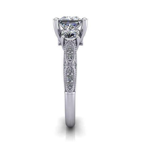 Rosemary princess three stone engagement ring in 14K White Gold, side profile showing the milgrain pav&eacute; band and vintage shoulders in profile