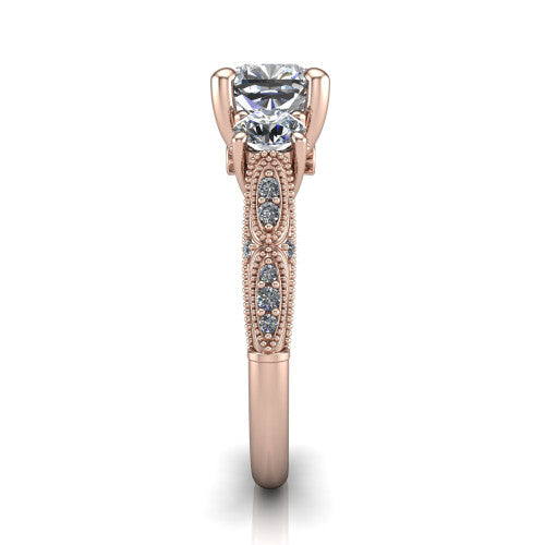 Rosemary cushion three stone engagement ring in 18K Rose Gold, side profile showing the milgrain pav&eacute; band and vintage shoulders in profile