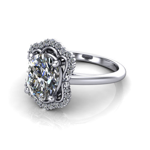 Heidi oval vintage halo engagement ring in Platinum, three-quarter perspective showing the center in a quatrefoil clover halo above a plain band