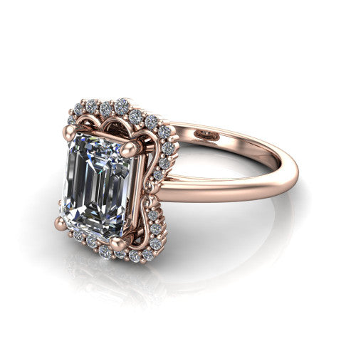 Heidi emerald vintage halo engagement ring in 14K Rose Gold, three-quarter perspective showing the center in a quatrefoil clover halo above a plain band
