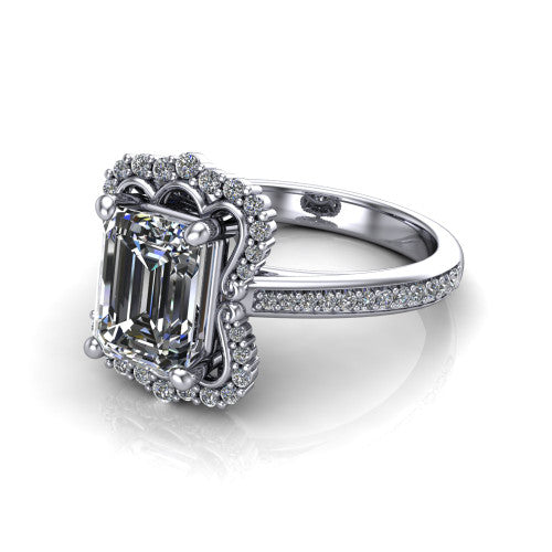 Madeleine emerald vintage halo engagement ring in 14K White Gold, three-quarter perspective showing the center in an ornate scalloped diamond halo above a pav&eacute; band