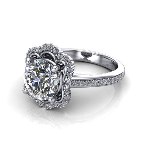 Madeleine round vintage halo engagement ring in Platinum, three-quarter perspective showing the center in an ornate scalloped diamond halo above a pav&eacute; band