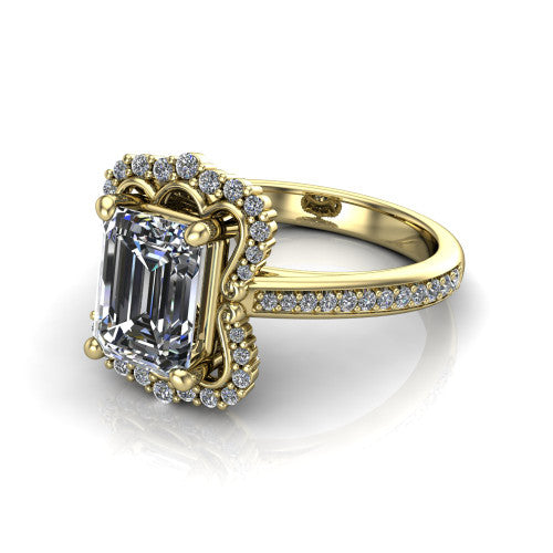 Madeleine emerald vintage halo engagement ring in 18K Yellow Gold, three-quarter perspective showing the center in an ornate scalloped diamond halo above a pav&eacute; band