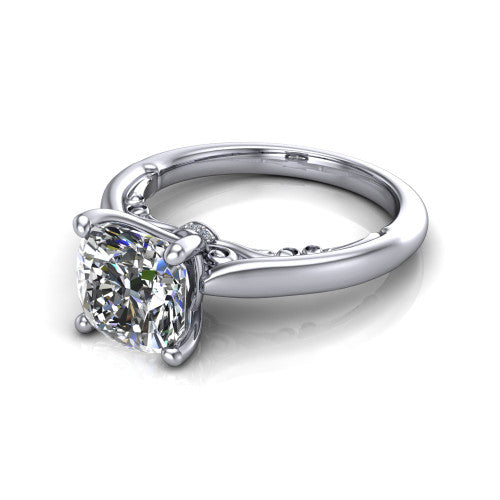 Lune cushion classic solitaire engagement ring in Platinum, three-quarter perspective showing the four-prong center above a plain band with a filigree gallery