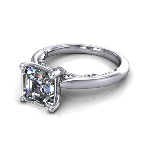 Lune square emerald classic solitaire engagement ring in 18K White Gold, three-quarter perspective showing the four-prong center above a plain band with a filigree gallery