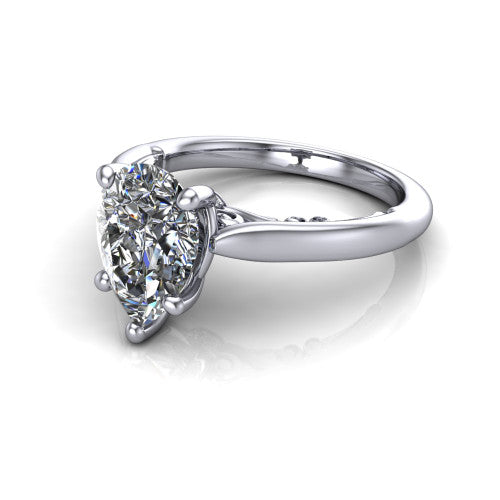 Lune pear classic solitaire engagement ring in 18K White Gold, three-quarter perspective showing the four-prong center above a plain band with a filigree gallery