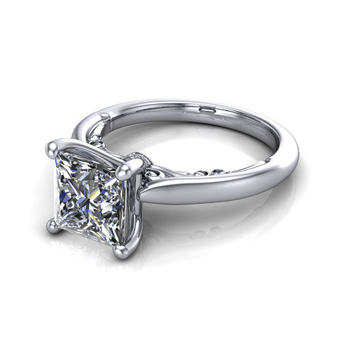 Lune princess classic solitaire engagement ring in 18K White Gold, three-quarter perspective showing the four-prong center above a plain band with a filigree gallery