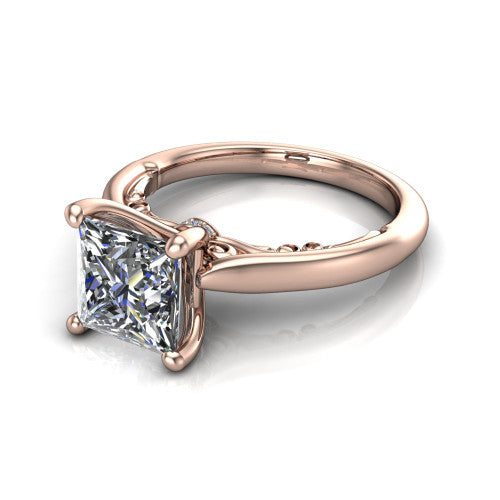Lune princess classic solitaire engagement ring in 18K Rose Gold, three-quarter perspective showing the four-prong center above a plain band with a filigree gallery