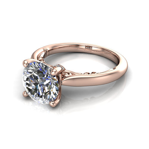 Lune round classic solitaire engagement ring in 14K Rose Gold, three-quarter perspective showing the four-prong center above a plain band with a filigree gallery
