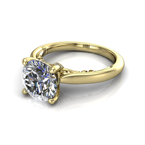 Lune round classic solitaire engagement ring in 14K Yellow Gold, three-quarter perspective showing the four-prong center above a plain band with a filigree gallery