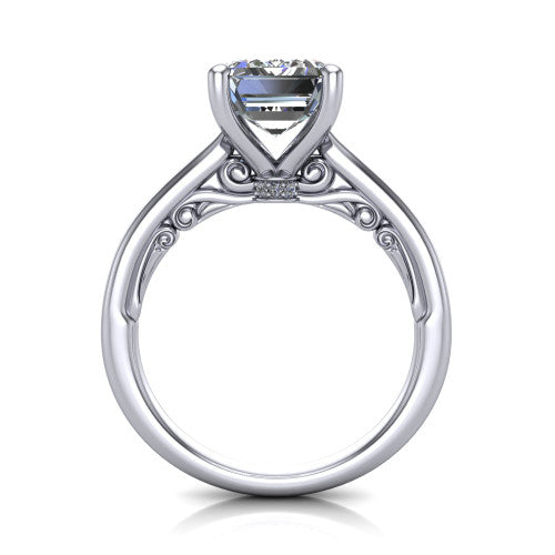 Lune emerald classic solitaire engagement ring in Platinum, through-finger front profile showing the filigree scroll gallery beneath the center