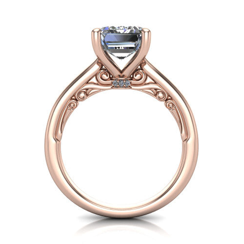 Lune emerald classic solitaire engagement ring in 14K Rose Gold, through-finger front profile showing the filigree scroll gallery beneath the center