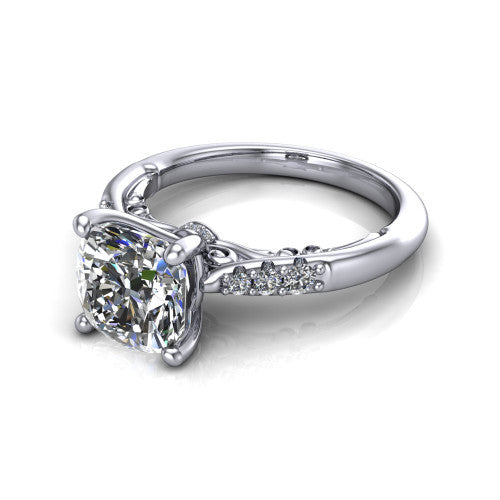 Jinnie cushion classic engagement ring in Platinum, three-quarter perspective showing the four-prong center above pav&eacute; shoulders with a filigree gallery
