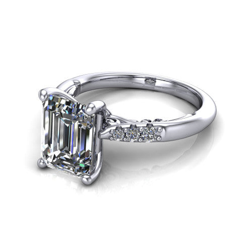 Jinnie emerald classic engagement ring in Platinum, three-quarter perspective showing the four-prong center above pav&eacute; shoulders with a filigree gallery
