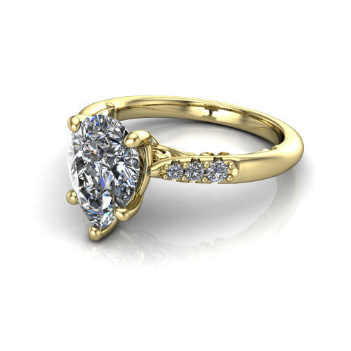 Jinnie pear classic engagement ring in 18K Yellow Gold, three-quarter perspective showing the four-prong center above pav&eacute; shoulders with a filigree gallery