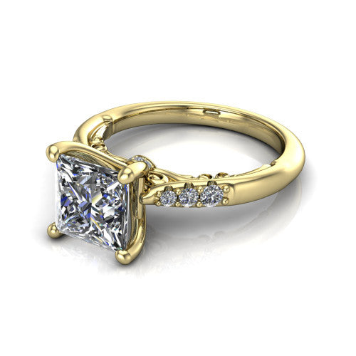 Jinnie princess classic engagement ring in 18K Yellow Gold, three-quarter perspective showing the four-prong center above pav&eacute; shoulders with a filigree gallery