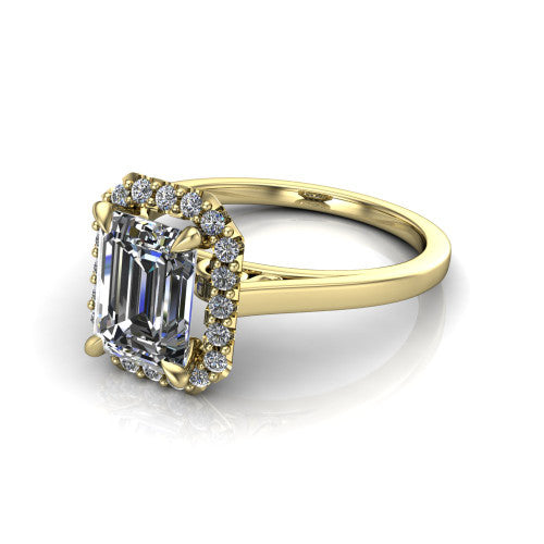 Esmeralda emerald halo engagement ring in 14K Yellow Gold, three-quarter perspective showing the haloed center above a plain band with a filigree gallery
