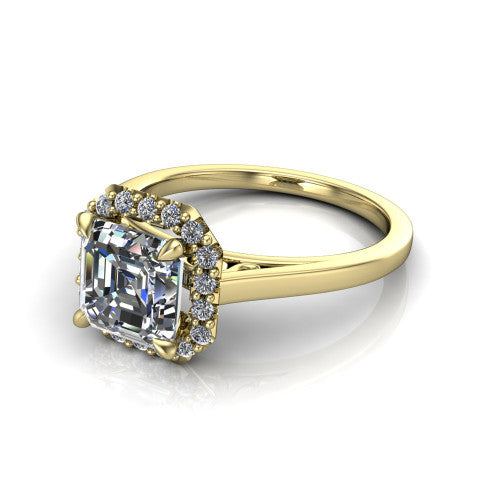 Esmeralda square emerald halo engagement ring in 18K Yellow Gold, three-quarter perspective showing the haloed center above a plain band with a filigree gallery