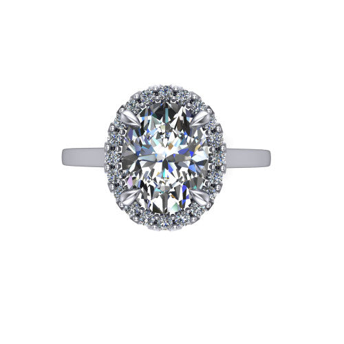 Esmeralda oval halo engagement ring in 18K White Gold, top-down view showing the center framed by a oval pave halo with compass prongs
