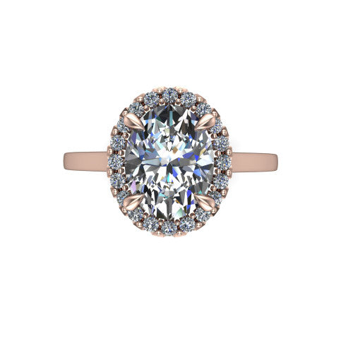 Esmeralda oval halo engagement ring in 18K Rose Gold, top-down view showing the center framed by a oval pave halo with compass prongs