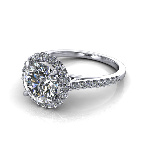 Birdie round halo engagement ring in 18K White Gold, three-quarter perspective showing the haloed center above a slim pav&eacute; band with a filigree gallery