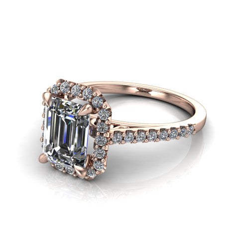 Birdie emerald halo engagement ring in 14K Rose Gold, three-quarter perspective showing the haloed center above a slim pav&eacute; band with a filigree gallery