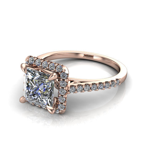 Birdie princess halo engagement ring in 14K Rose Gold, three-quarter perspective showing the haloed center above a slim pav&eacute; band with a filigree gallery