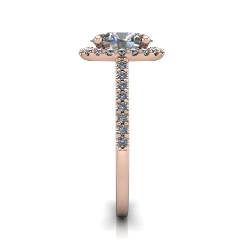 Birdie oval halo engagement ring in 14K Rose Gold, top-down view showing the center framed by a oval pav&eacute; halo with compass prongs
