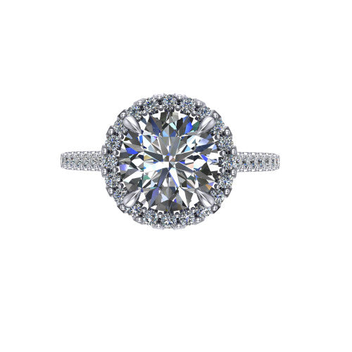 Birdie round halo engagement ring in 18K White Gold, top-down view showing the center framed by a round pav&eacute; halo with compass prongs