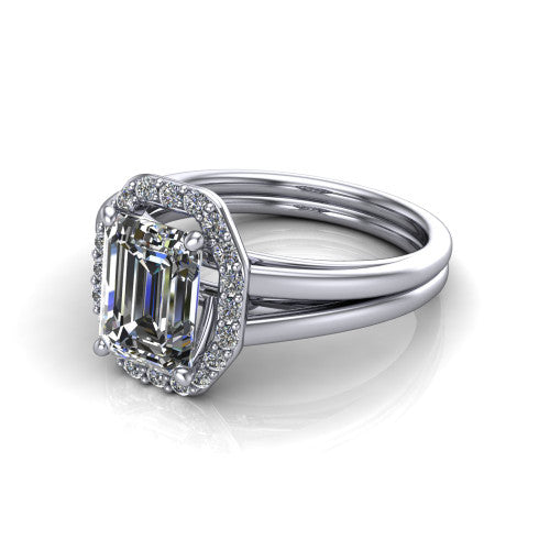 Regina emerald halo engagement ring in Platinum with squared pavé halo and plain split shank, three-quarter perspective view